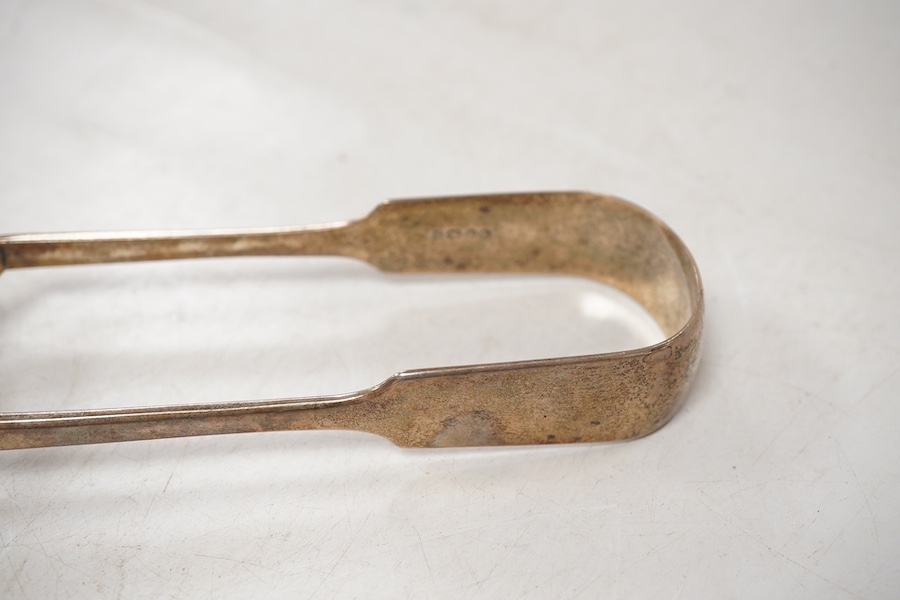 A pair of Victorian silver fiddle pattern asparagus servers, Francis Higgins, London, 1861, 24.5cm.